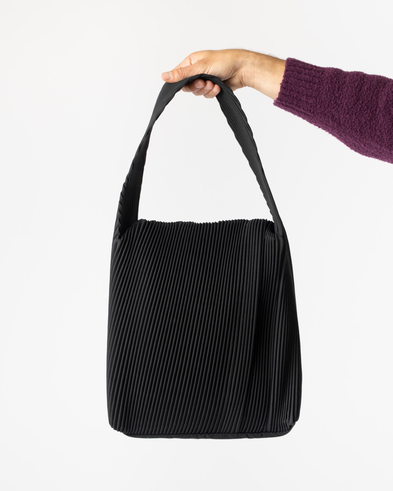 Homme Plissé Issey Miyake Rounded Square Bag in Black Curated at