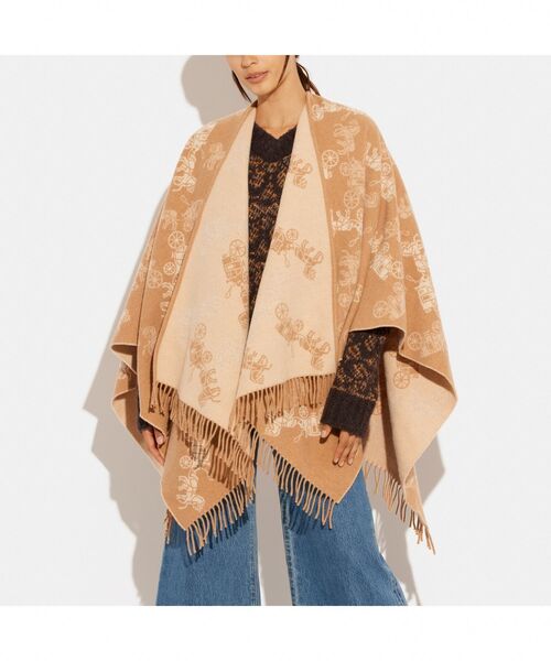 COACH（コーチ）の「リバーシブル ホース アンド キャリッジ ポンチョ