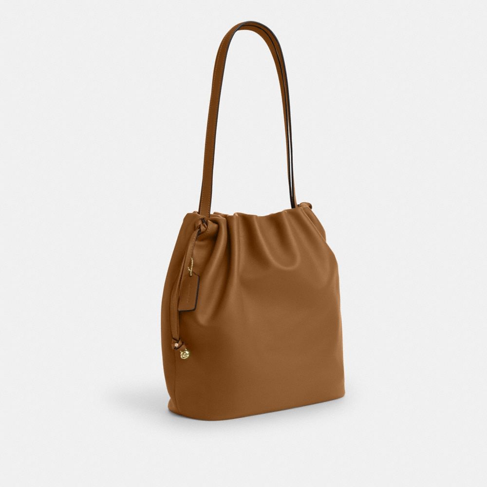 公式】コーチアウトレット | フェイ ドローストリング トート バッグ