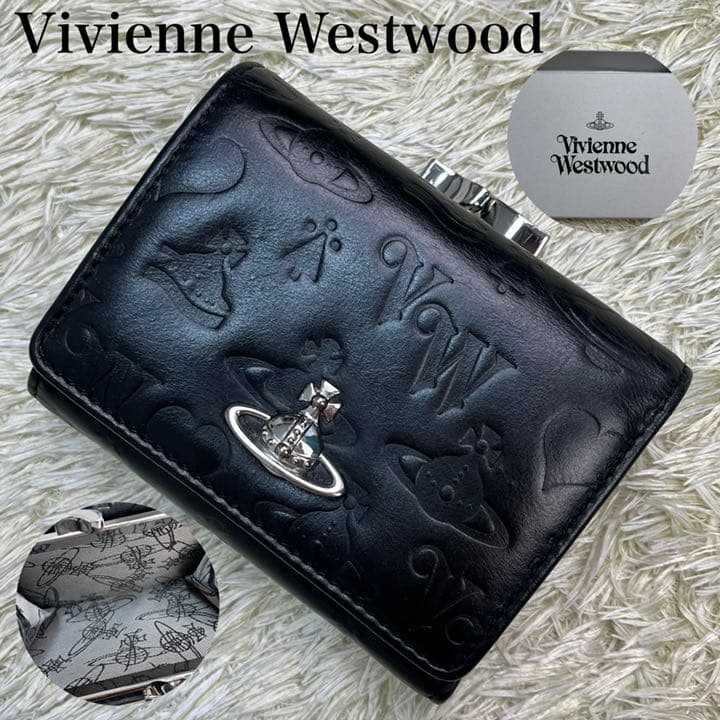 ヴィヴィアンウエストウッド がま口 三つ折り財布 総柄型押し レザー
