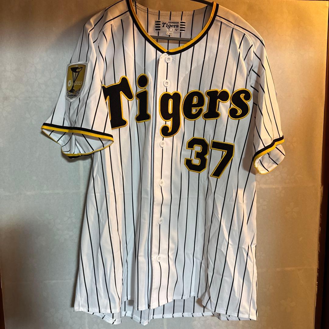 阪神タイガース チャンピオンエンブレム付きユニフォーム 及川雅貴　Lサイズ 新品未使用 及川雅貴 M 阪神タイガース ホーム レプリカユニフォーム