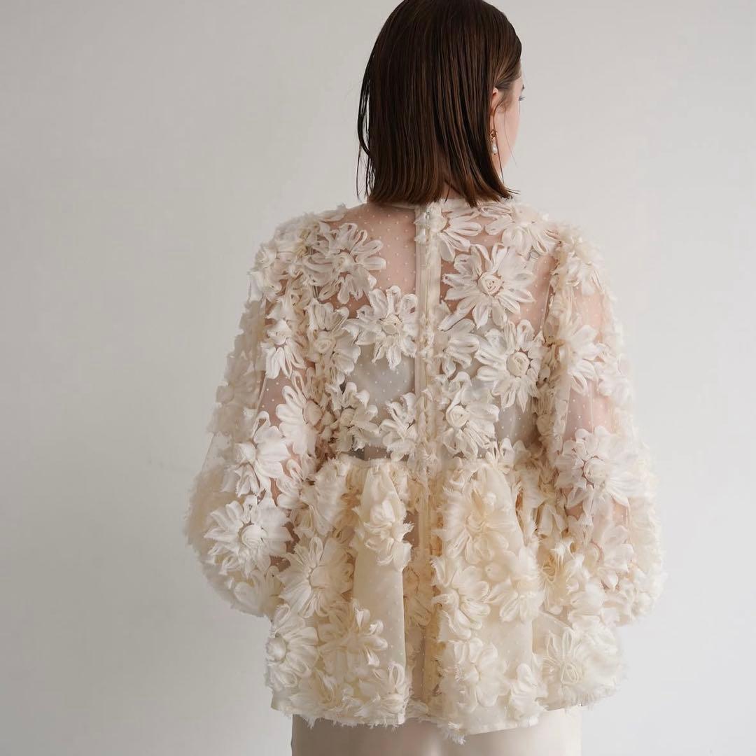 土日限定価格】acka flower peplum blouse - メルカリ