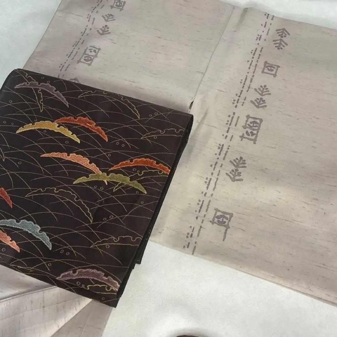 着物単品 袷 白山工房 牛首紬 染色家 市川純一郎 薄小豆色 草花 作家