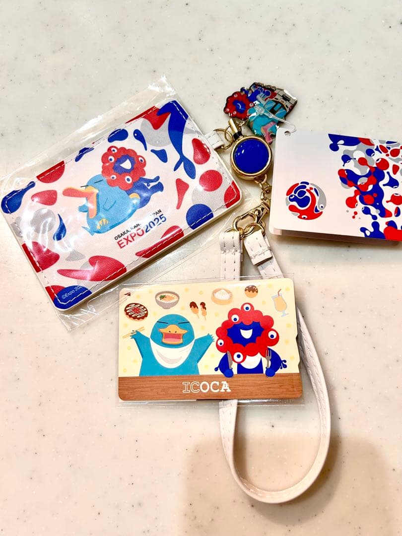 関西万博2025 ICOCAカード＆合皮パスケースセット Amazon.co.jp: 大阪万博 合皮製 パスケース カードケース リール付き
