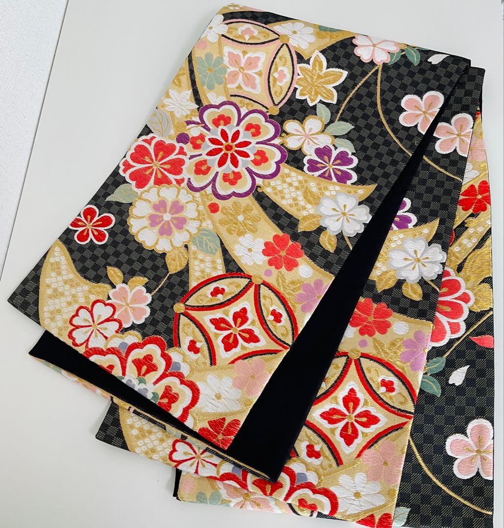 ぐ*ん様 袋帯　振袖用袋帯No.169 黒系　七宝　熨斗　古典華紋様 袋帯 振袖用袋帯No.169 黒系 七宝 熨斗 古典華紋様 - メルカリ