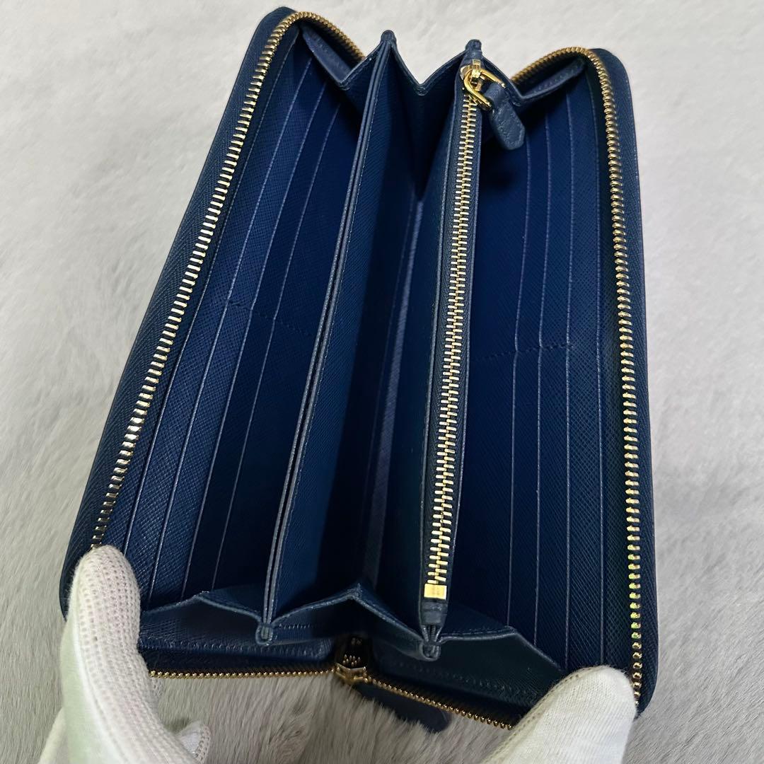 PRADA プラダ 長財布 ラウンドジップ ブルー ゴールドロゴ - メルカリ