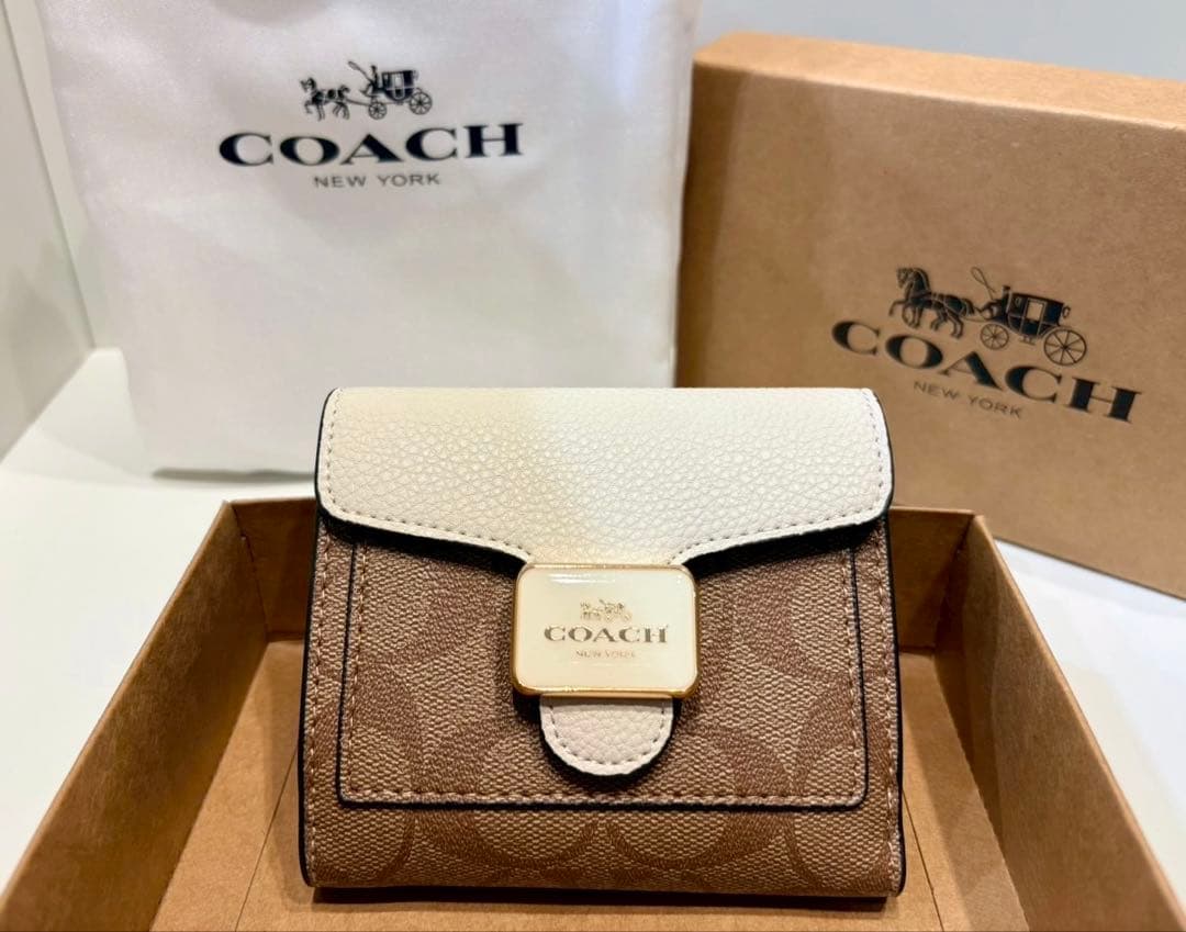 COACH コーチ 二つ折り財布 ブラウン/ホワイト - メルカリ