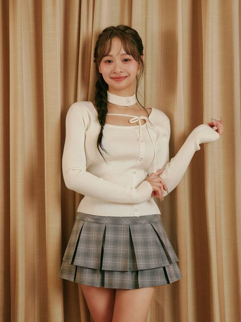 BUBBLES チョーカーボタンニットトップス - メルカリ