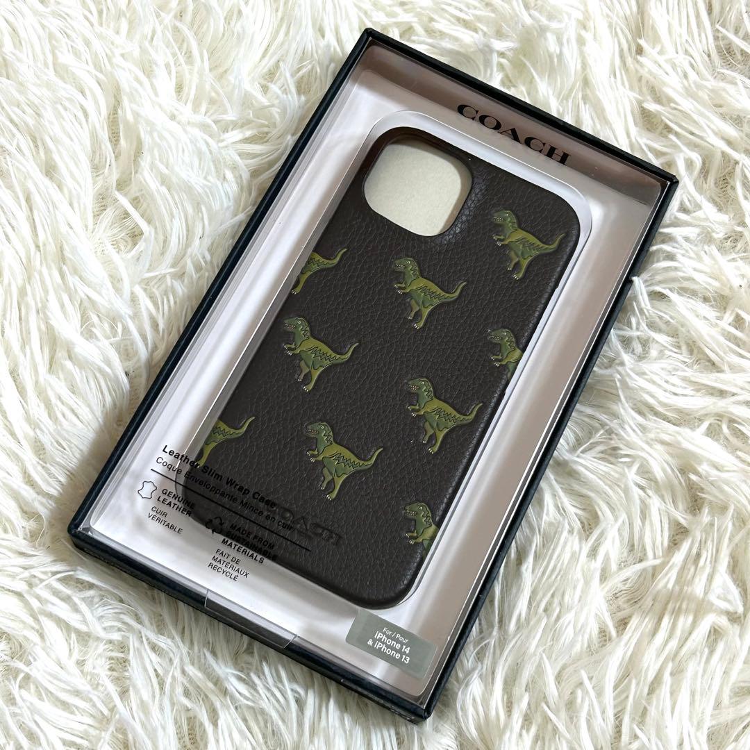 新品未使用✨人気完売品 コーチ 恐竜柄 レキシー iPhone14 13ケース