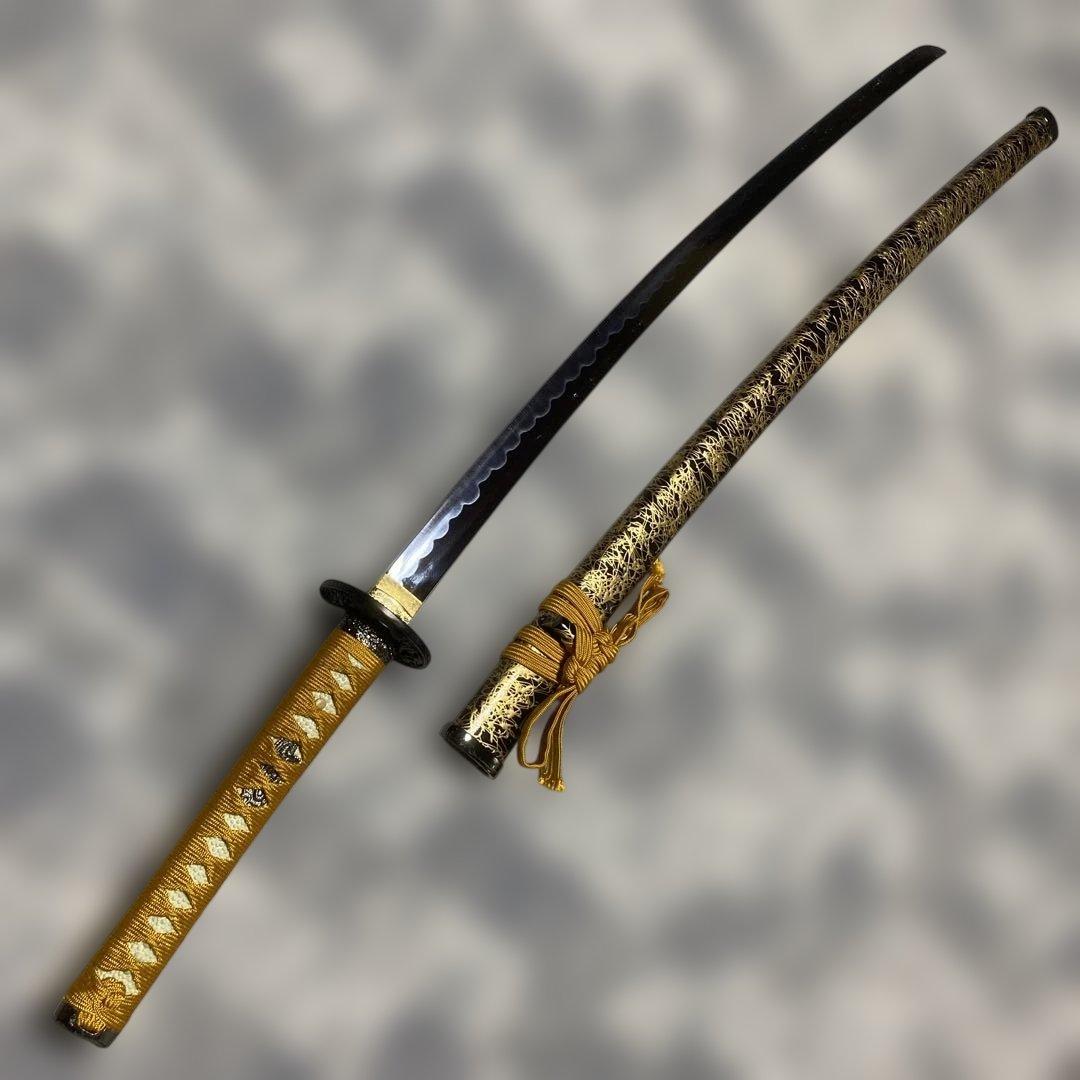 高級模造刀 蜜柑色柄 雲龍楕円黒鍔 金口金尻金糸黒呂鞘 - メルカリ