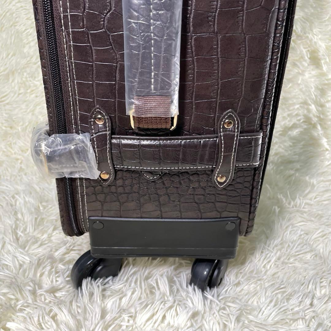SWANY スワニー クロコ型押し キャリーバッグ ダークブラウン - メルカリ