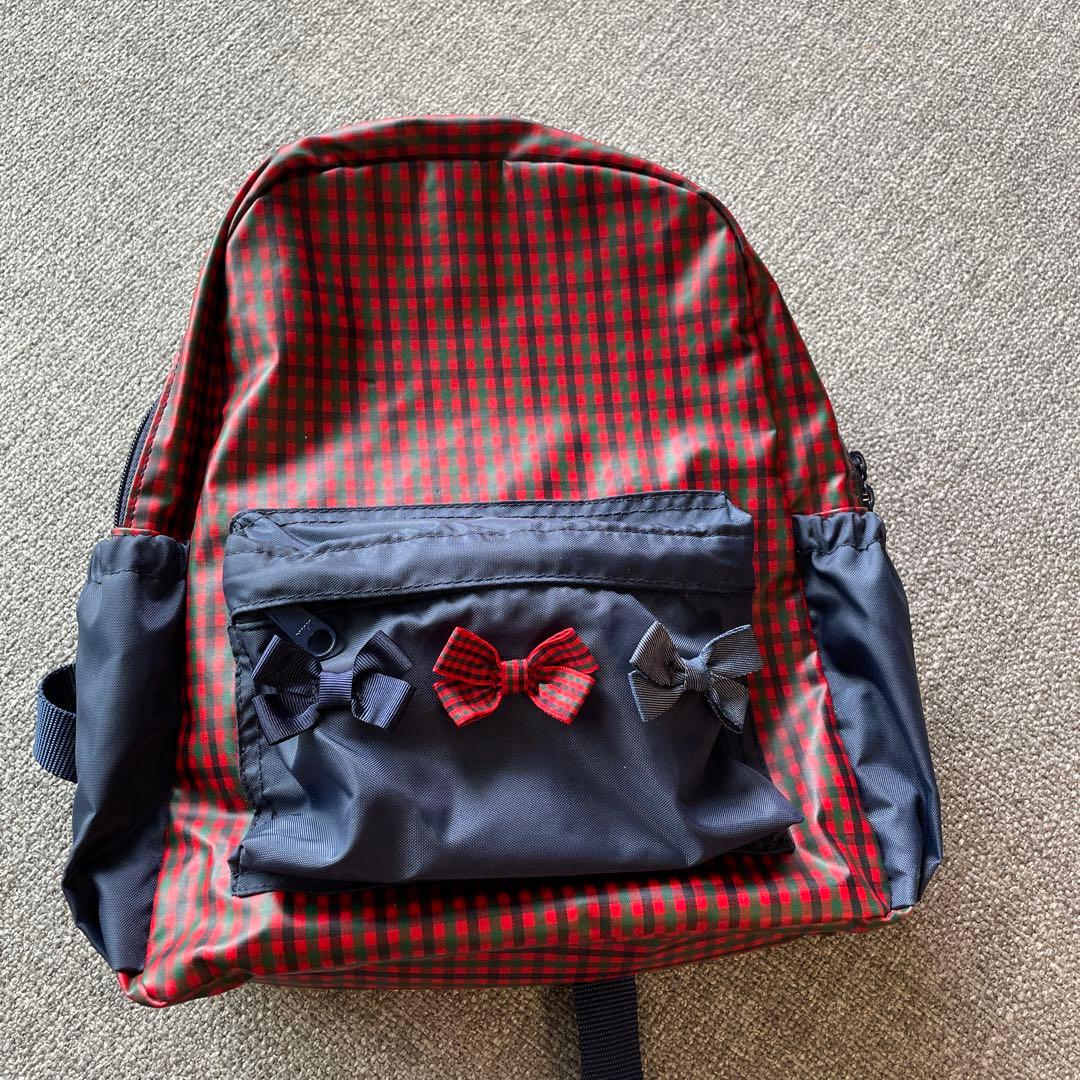 ファミリア　リボン付き赤黒チェックリュック 人気リュックサック紹介｜ファミリア三越銀座店ファミリアショップの
