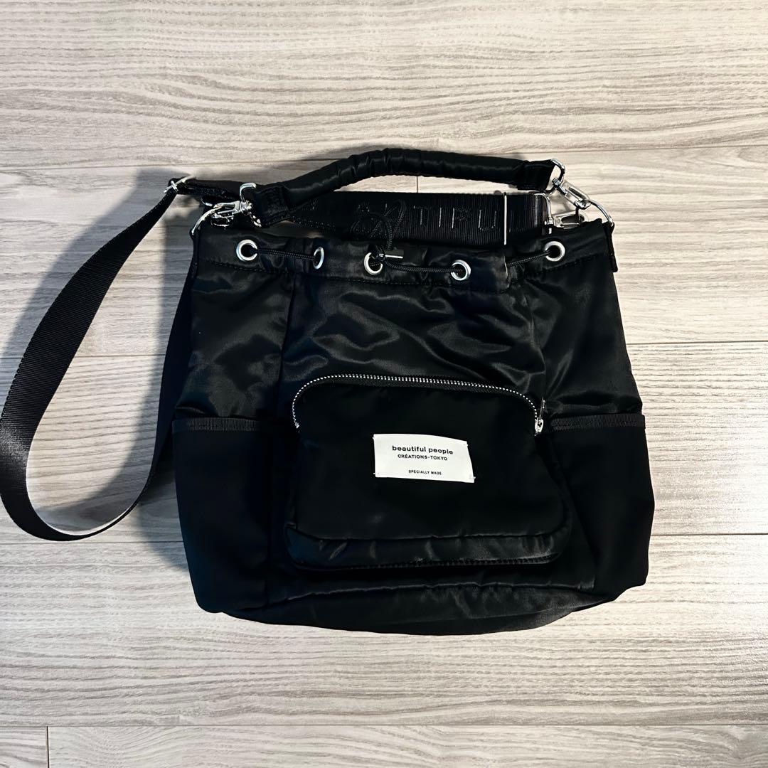 最終値下！beautiful people×STUDIOUS ナイロン巾着バッグ - メルカリ