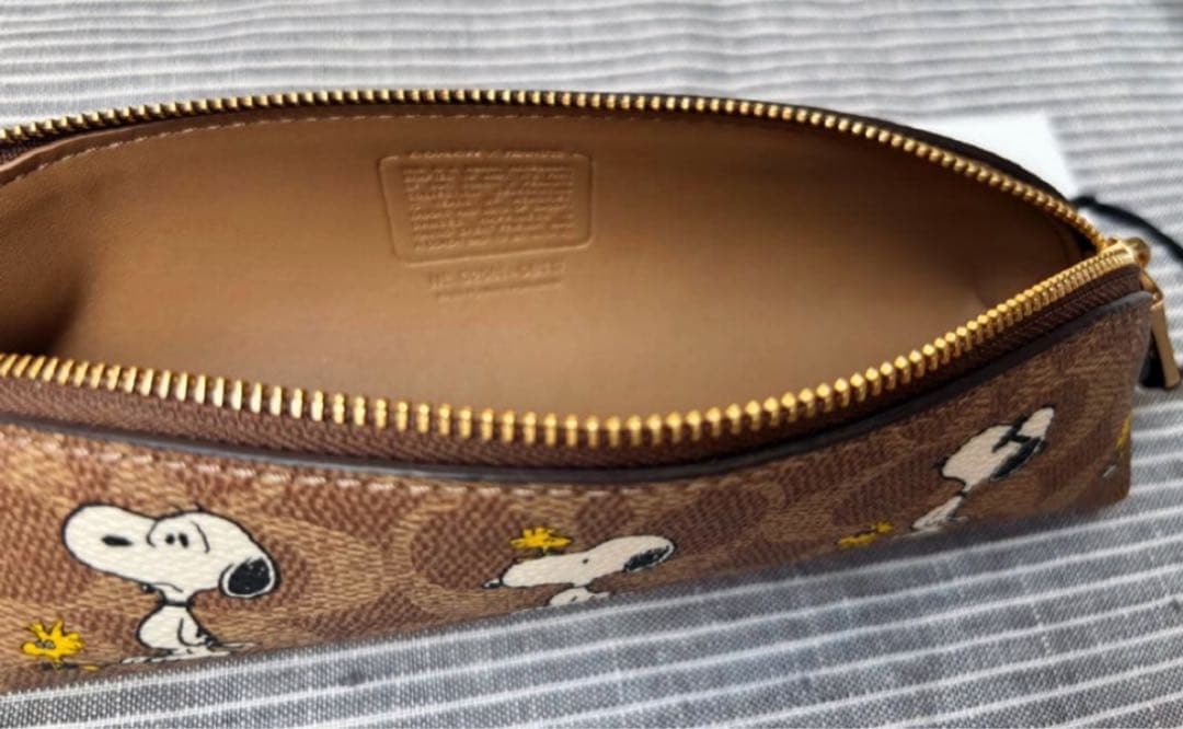 ☆COACH x PEANUTS スヌーピーペンケース未使用☆ - メルカリ