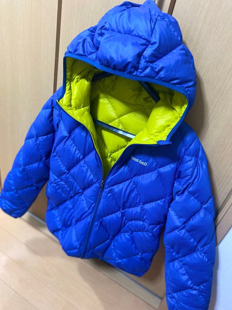 mont-bell リバーシブルダウンジャケット 青/黄 - メルカリ