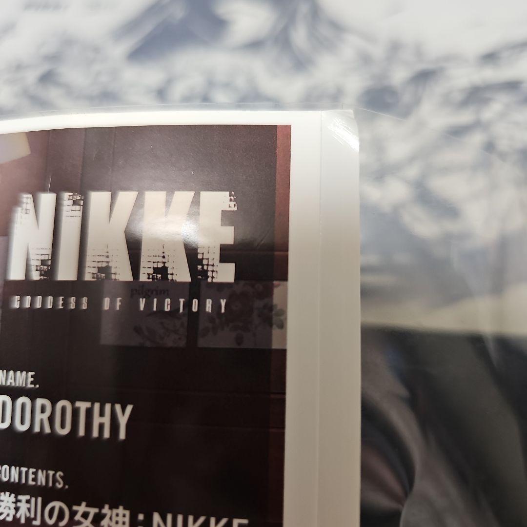 勝利の女神:NIKKE × HUB コラボグッズ ドロシー TAGラベル - メルカリ
