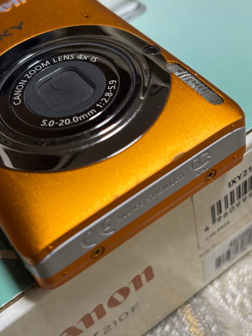 キヤノン コンパクトデジタルカメラIXY 210F オレンジ - メルカリ