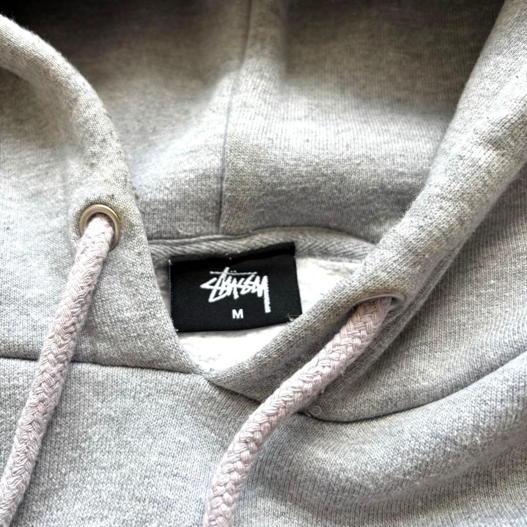 Stussy グレー フード付きパーカー M - メルカリ