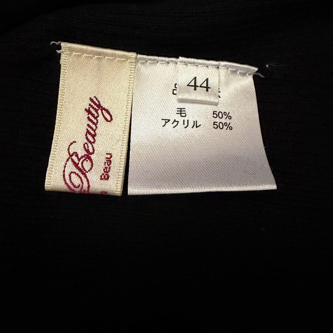 スーパービューティー新品未使用タートルネック袖口がリボン飾りで