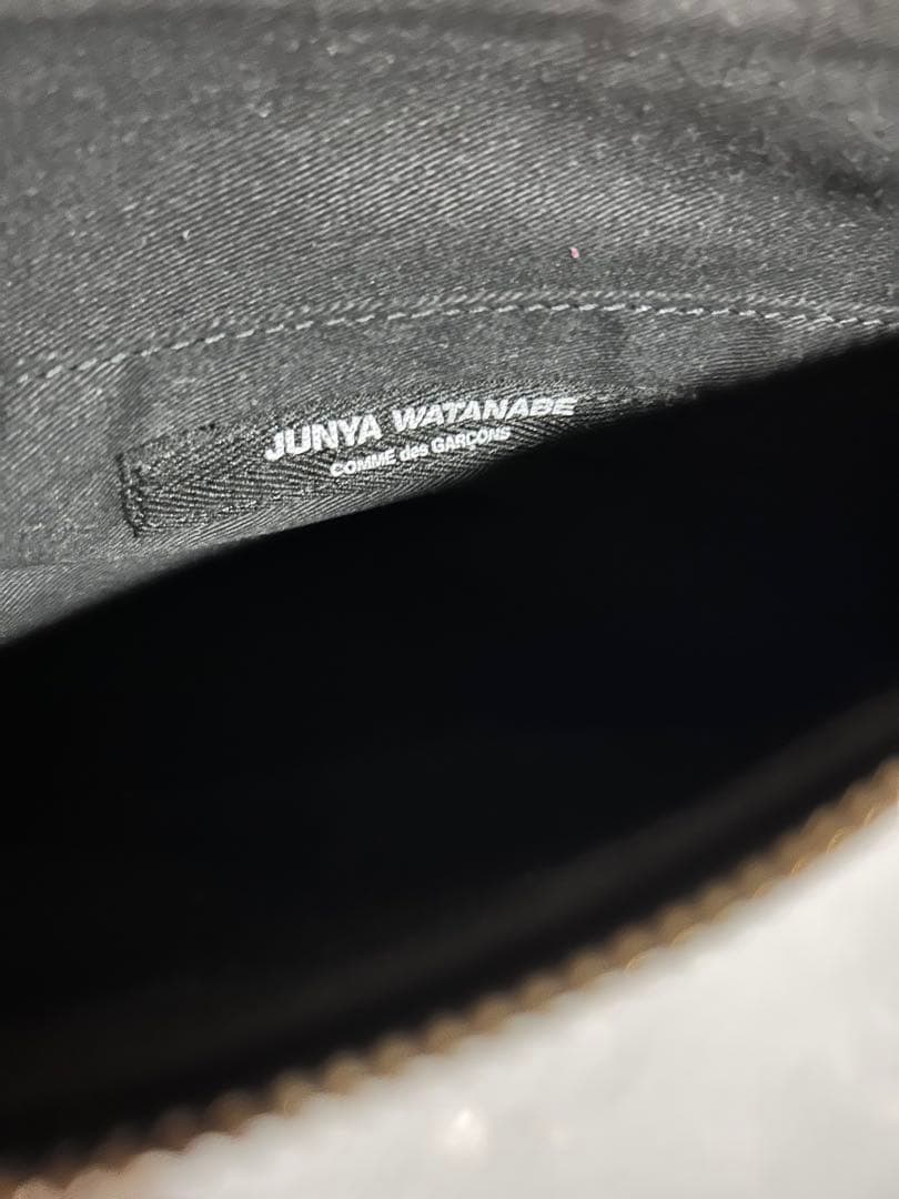 ジュンヤワタナベ スタッズ装飾 黒 レザーポーチ - メルカリ