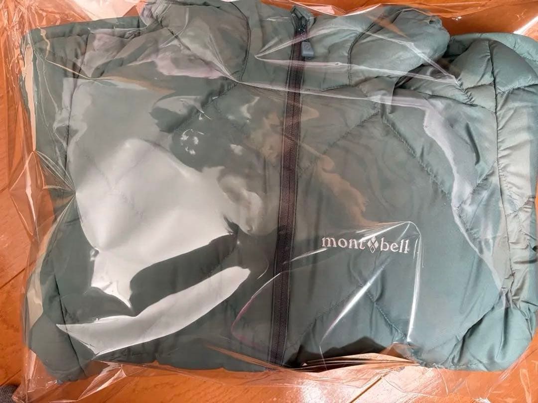 montbell 水色 ネージュダウンパーカ レディースS袋付き - メルカリ