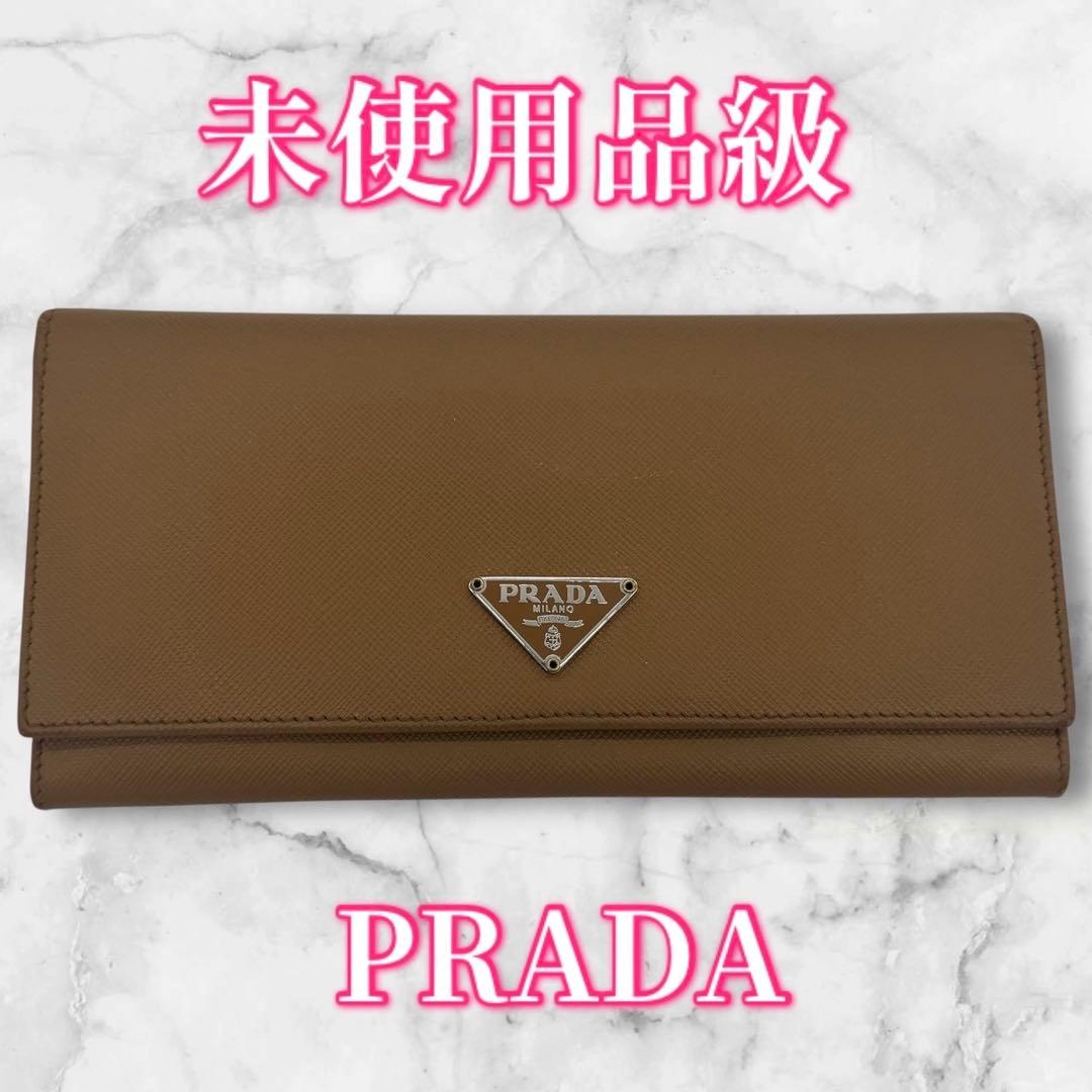 未使用品級✨PRADA 長財布 サフィアーノ ブラウン キャメル PRADA プラダ サフィアーノ 長財布 ブラウン 三角ロゴ - メルカリ