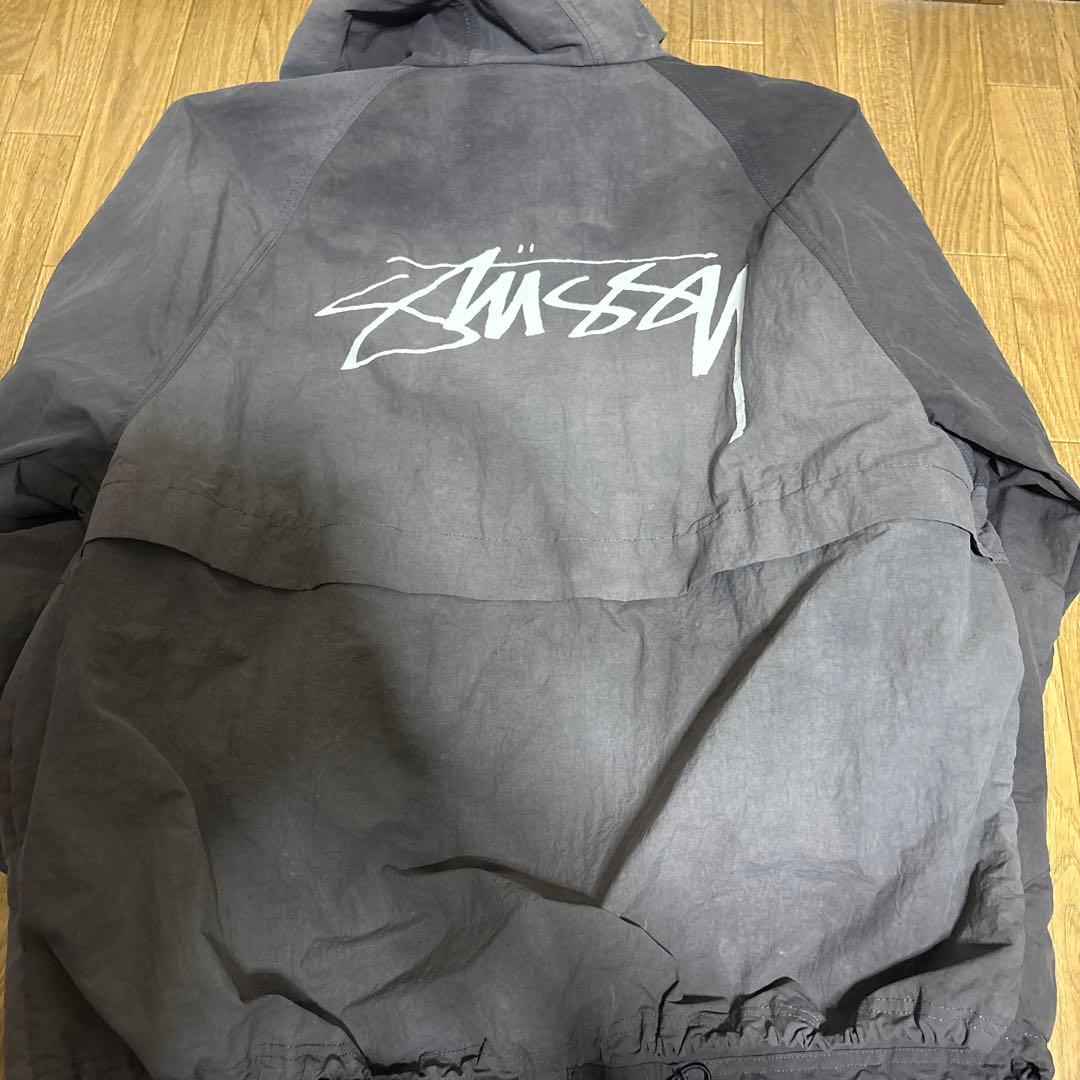 Stussy グレー フード付きナイロンジャケット - メルカリ