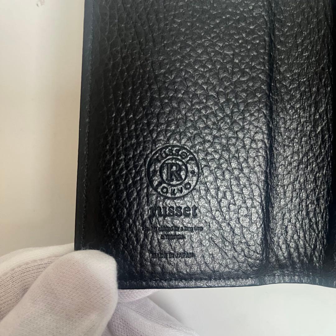 未使用 russet モノグラムプレート ラウンドファスナー 折り財布 シボ