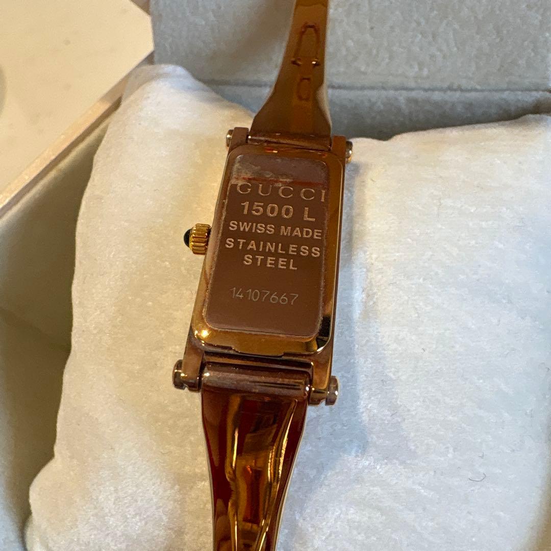 Gucci ゴールド アナログ腕時計 - メルカリ